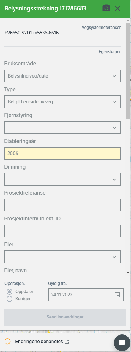 Innlasting med lastende endring. Vises med et spinnende hjul og beskrivende tekst nederst.